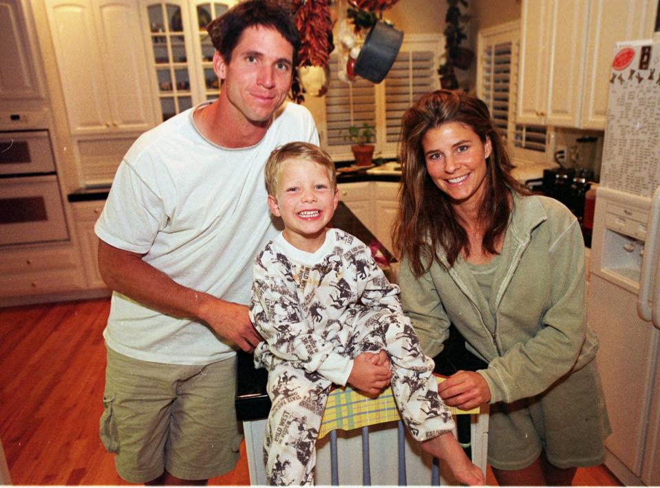 Former Denver Broncos wide receiver Ed McCaffrey, left, with then 5-year-old son Christian, and wife Lisa in 2000. (AP)