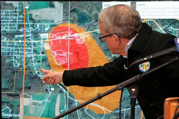 PHOTO: Ohio Gov. Mike DeWine points to a map of East Palestine, Ohio that indicates the area that has been evacuated as a result of Norfolk Southern train derailment, after touring the site, Feb. 6, 2023, in East Palestine, Ohio. (Gene J. Puskar/AP)