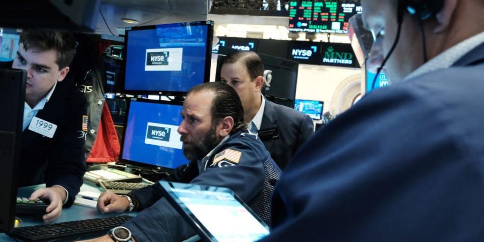 Traders on the floor of the New York Stock Exchange (NYSE)