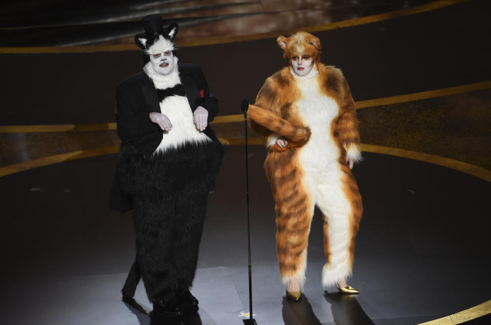 James Corden, left, and Rebel Wilson present the award for best visual effects at the Oscars on Sunday, Feb. 9, 2020, at the Dolby Theatre in Los Angeles. (AP Photo/Chris Pizzello)