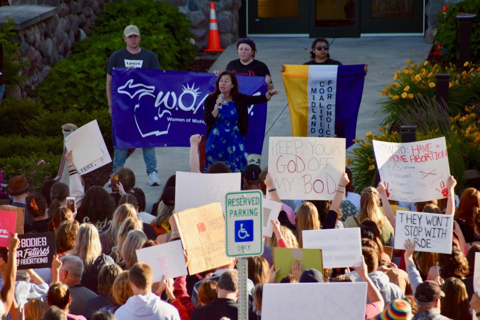 Kristen McDonald Rivet, Democratic candidate for Michigan Senate District 35, speaks at a reproductive rights rally in Midland, Michigan, on June 27, 2022.