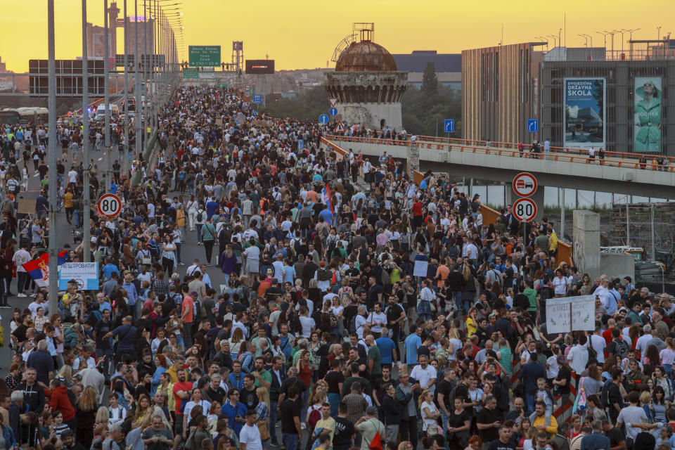 People march on a highway during a protest, in Belgrade, Serbia, Saturday, June 17, 2023. Tens of thousands of anti government protesters have staged marches in Belgrade and other Serbian towns against Serbian President Aleksandar Vucic, pledging to “radicalize” weeks of peaceful gatherings that have shaken his autocratic rule. The demonstrators in Belgrade blocked the main highway that leads through the capital and chanted slogans for Vucic to resign, something that he has repeatedly rejected. (AP Photo/Milos Miskov)
