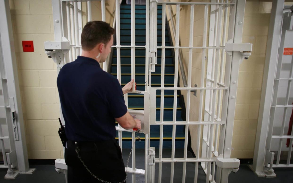 The Government is recruiting thousands of new prison officers - PA