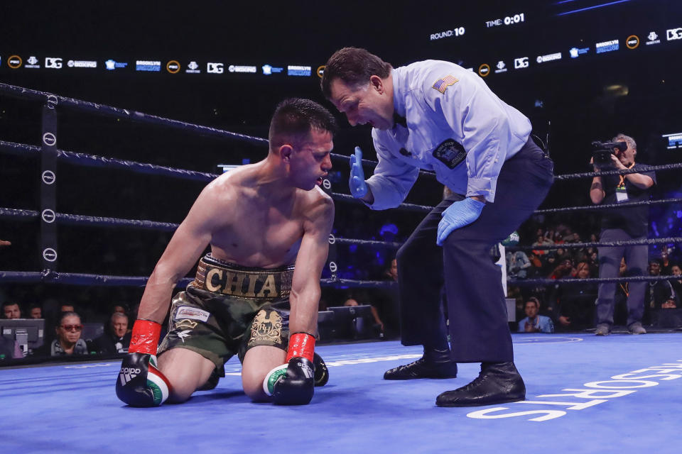 The referee counts for Francisco Santana after Santana was knocked down by Jarret Hurd during the 10th round of a super welterweight boxing match Saturday, Jan. 25, 2020, in New York. Hurd won the fight. (AP Photo/Frank Franklin II)
