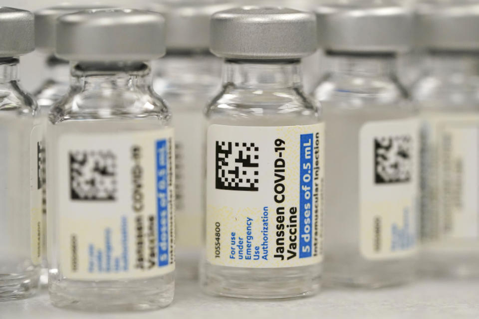 FILE - This Saturday, March 6, 2021 file photo shows vials of Johnson & Johnson COVID-19 vaccine at a pharmacy in Denver. Hundreds of thousands of COVID-19 vaccine doses have been saved from the trash after U.S. regulators extended their expiration date for a second time, part of a nationwide effort to salvage expiring shots to battle the nation's summer surge in infections. The Food and Drug Administration on Wednesday, July 28, 2021 sent a letter to shot maker Johnson & Johnson declaring that the doses remain safe and effective for at least six months when properly stored.(AP Photo/David Zalubowski, File)