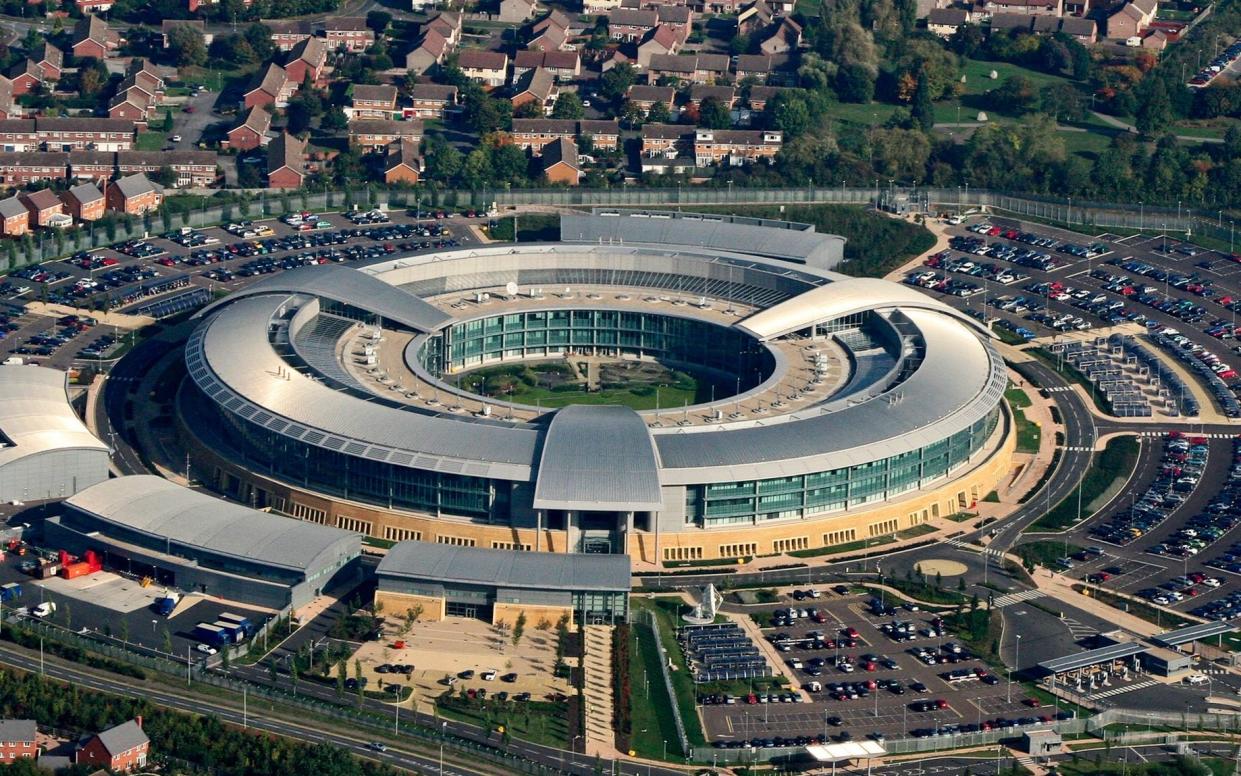 GLOUCESTERSHIRE, ENGLAND - OOCTOBER 10: Amidst the houses and the car parks sits GCHQ the Government Communications Headquarters in this aerial photo taken on October 10, 2005. (Photo by David Goddard/Getty Images) - Getty Images