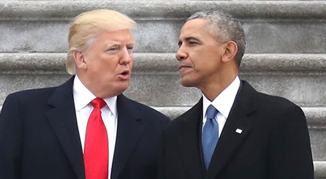 President Donald Trump speaks with former President Barack Obama at January's innauguration. Photo: AP