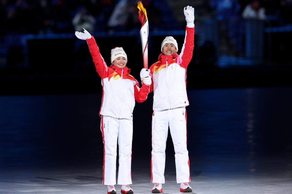 Olympic Flame Lights Up Unique Snowflake-Shaped Cauldron as Winter Games  Begin in Beijing