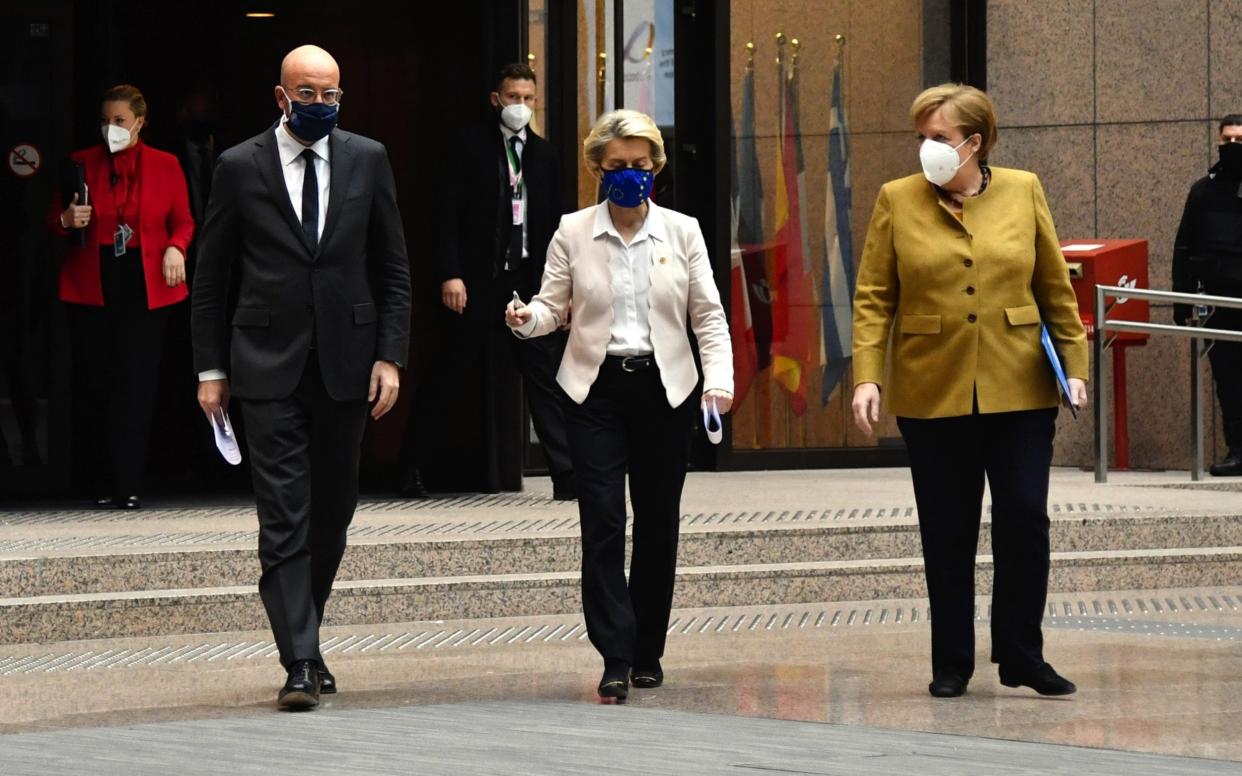 Charles Michel, president of the European Council, left, Ursula von der Leyen, president of the European Commission, center, and Angela Merkel, Germany's chancellor - Geert Vanden Wijngaert /Bloomberg