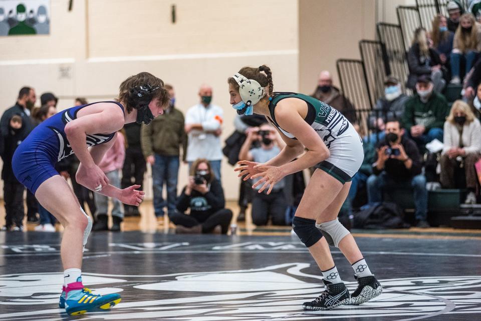 Monroe-Woodbury's Maxim Javorsky, left, wrestles Minisink Valley's Sofia Macaluso during the Section 9 duals finals matchup at Minisink Valley High School in Slate Hill on Wednesday, January 12, 2022.