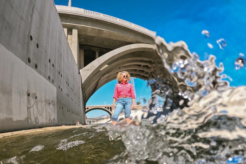 LOS ANGELES, CA - OCTOBER 10: Artist Lauren Bon, shown at the Los Angeles River, and her non-profit art and research hub, Metabolic Studio, have spent the last dozen years working on a project called "Bending the River," that will draw water from the L.A. River in downtown L.A., clean it and use it to irrigate Los Angeles State Historic Park. Photo taken in Los Angeles River in Los Angeles Tuesday, Oct. 10, 2023. (Allen J. Schaben / Los Angeles Times)