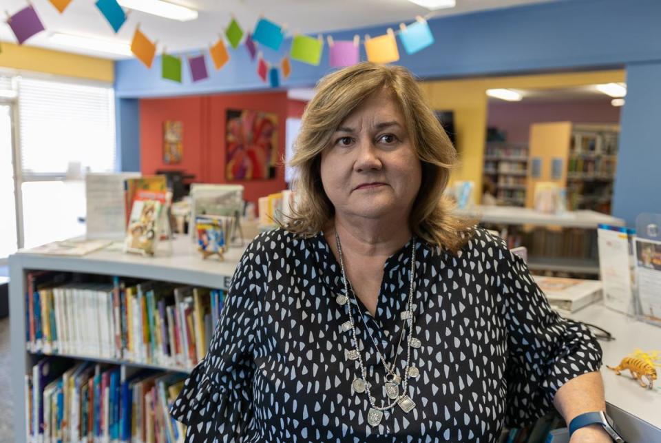 Director Dianne Connery poses for a portrait inside the Pottsboro library in Pottsboro, Texas on Aug. 18, 2023. 