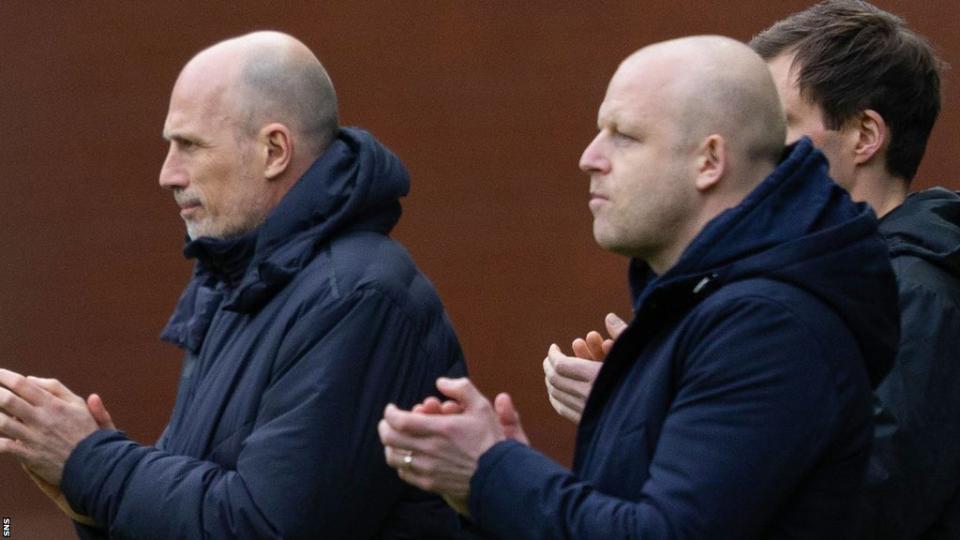 Steven Naismith and Philippe Clement on the touchline