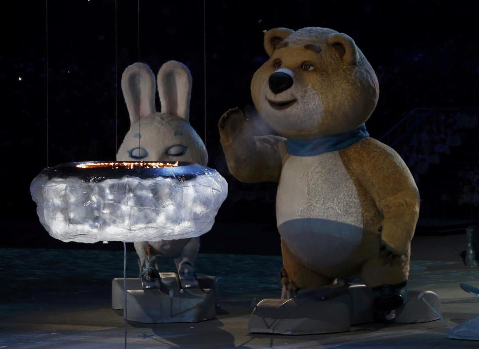 The Olympic mascots of a hare and a bear (R) take part in the closing ceremony for the 2014 Sochi Winter Olympics, February 23, 2014. REUTERS/Gary Hershorn (RUSSIA - Tags: OLYMPICS SPORT)