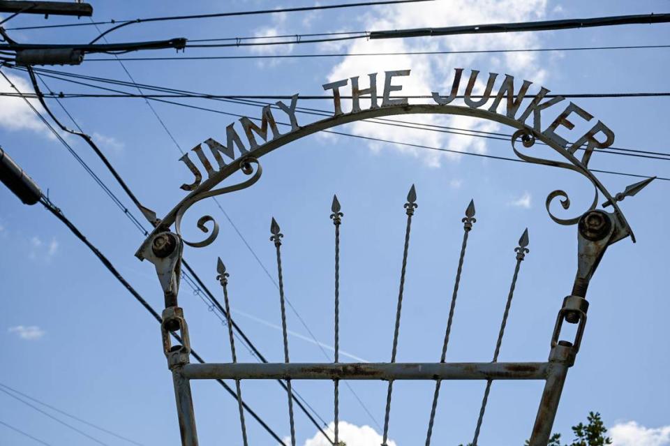 A sign declaring “Jimmy the Junker” stands above Jim Williams’ yard in the Fresno High area where he has created an eye-catching array of art over many decades. CRAIG KOHLRUSS/ckohlruss@fresnobee.com