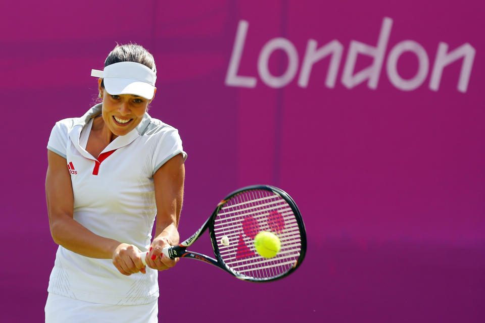 LONDON, ENGLAND - JULY 28: Ana Ivanovic of Serbia returns a shot against Christina Mchale of the United States on Day 1 of the London 2012 Olympic Games at the All England Lawn Tennis and Croquet Club in Wimbledon on July 28, 2012 in London, England. (Photo by Phil Walter/Getty Images)