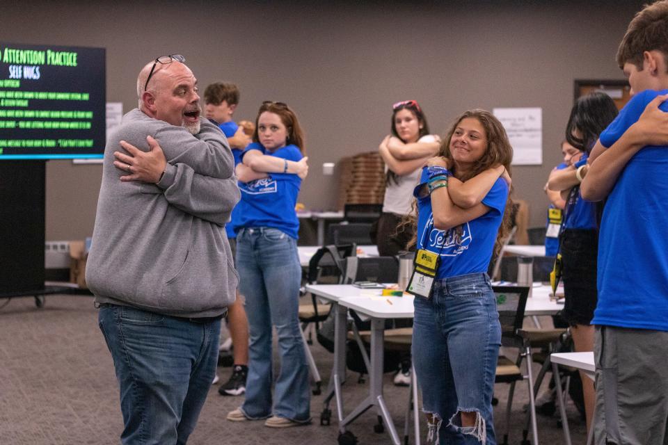 Dustin Springer, principal of Gray Hawk Elementary School in Basehor, led Kansas Future Teacher Academy campers in a session about social-emotional learning and self-care.