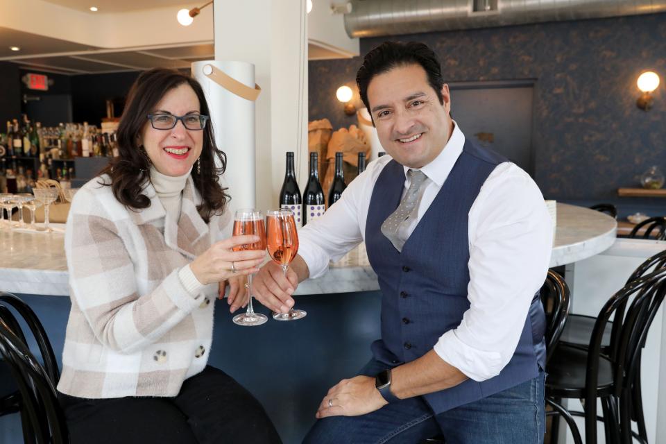Lohud food and dining reporter Jeanne Muchnick enjoys a glass of the alcohol-free Thomson & Scott Noughty Rose with owner Paul Molakides at Boro6 Wine Bar in Hastings-on-Hudson, Jan. 31, 2024.