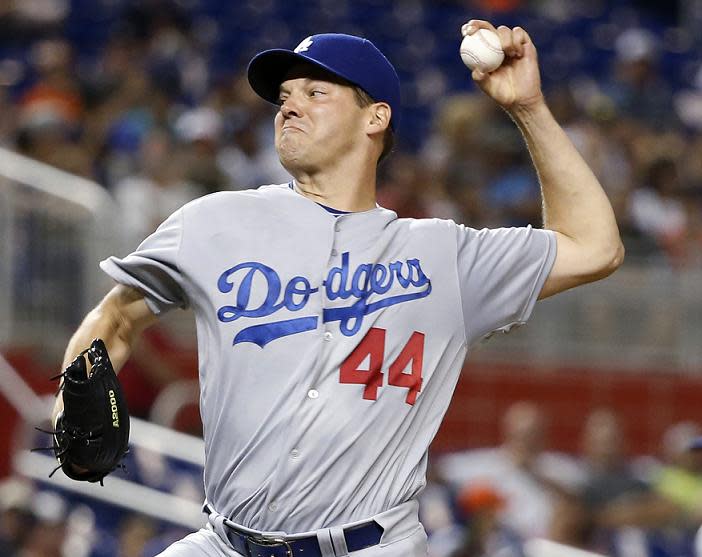 Rich Hill was pulled Saturday seven innings into a perfect game bid against the Marlins. (AP)