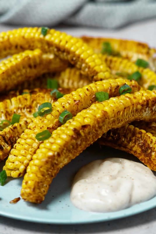 <p>Plant Based Folk</p><p>At first, these "ribs" might have you wondering "why" and then you'll be wondering why it took so long to come up with this idea!</p><p><strong>Get the recipe: </strong><a href="https://plantbasedfolk.com/air-fryer-corn" rel="nofollow noopener" target="_blank" data-ylk="slk:Air Fryer Corn Ribs;elm:context_link;itc:0;sec:content-canvas" class="link rapid-noclick-resp"><strong>Air Fryer Corn Ribs</strong></a></p><p><strong>Related: <a href="https://parade.com/1292137/parade/corn-recipes/" rel="nofollow noopener" target="_blank" data-ylk="slk:100 Corn Recipes;elm:context_link;itc:0;sec:content-canvas" class="link rapid-noclick-resp">100 Corn Recipes</a></strong></p>