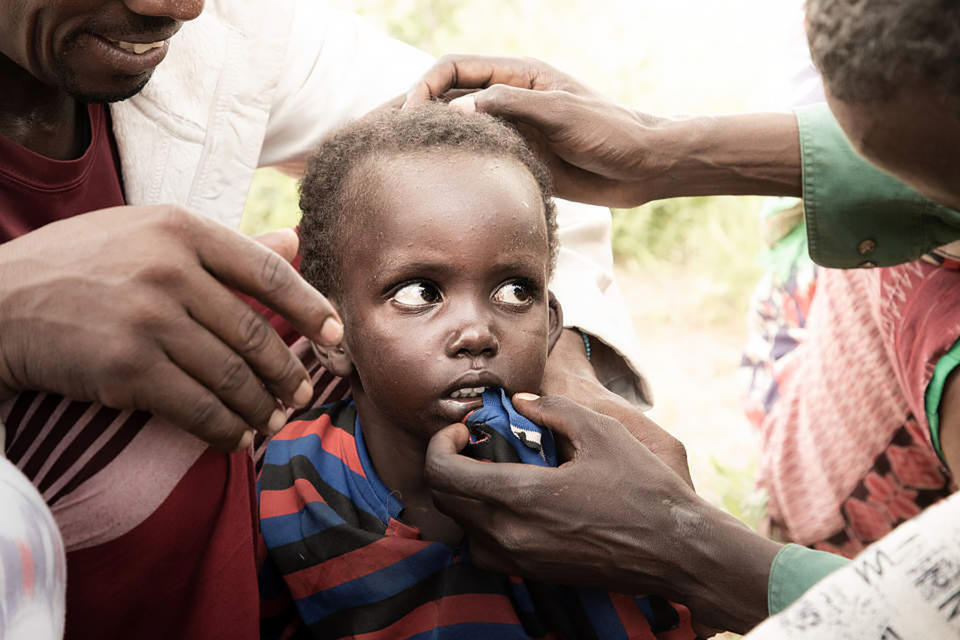 The little boy, Ayub, was alone in the wilderness and up against poor weather, starvation, predators and a case of malaria.  (Courtesy Sheldrick Wildlife Trust)