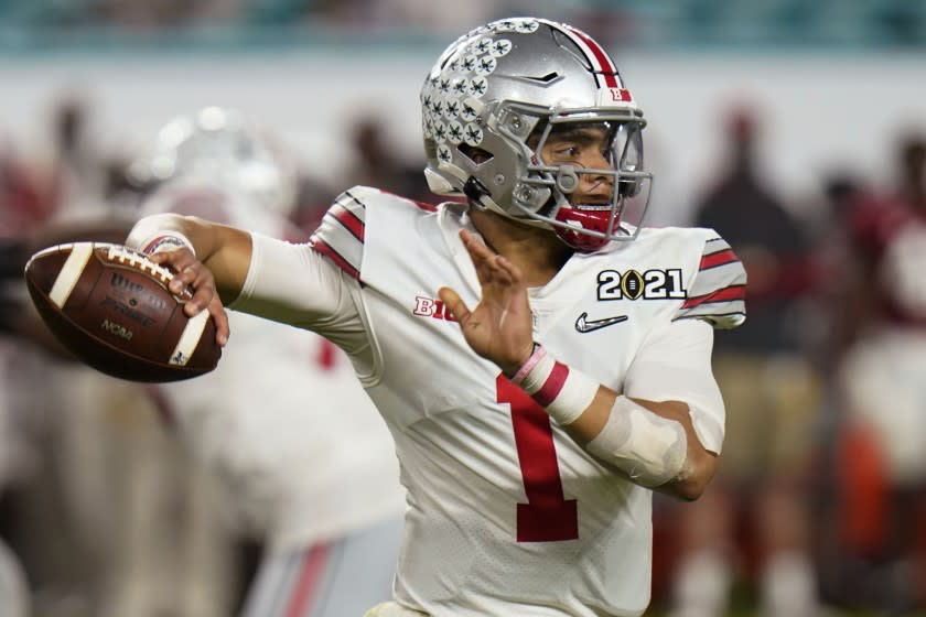 Ohio State quarterback Justin Fields passes against Alabama during the second half of an NCAA College Football Playoff.