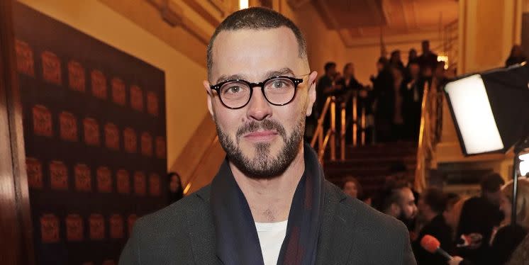 matt willis poses on the red carpet at a theatre performance in february 2020