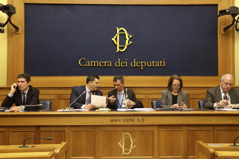 From left, Italian radical party lawmaker Riccardo Maggi, Mark Rozzi, Democratic member of the Pennsylvania House of Representatives, Italian survivor of sex abuse Francesco Zanardi, Anne Barrett Doyle, of Bishop Accountability, and Tim Lennon, of SNAP, attend a press conference at the Italian Lower Chamber press hall in Rome, Thursday, Feb. 21, 2019. Pope Francis opened a landmark sex abuse prevention summit Thursday by warning senior Catholic figures that the faithful are demanding concrete action against predator priests and not just words of condemnation. (AP Photo/Gregorio Borgia)