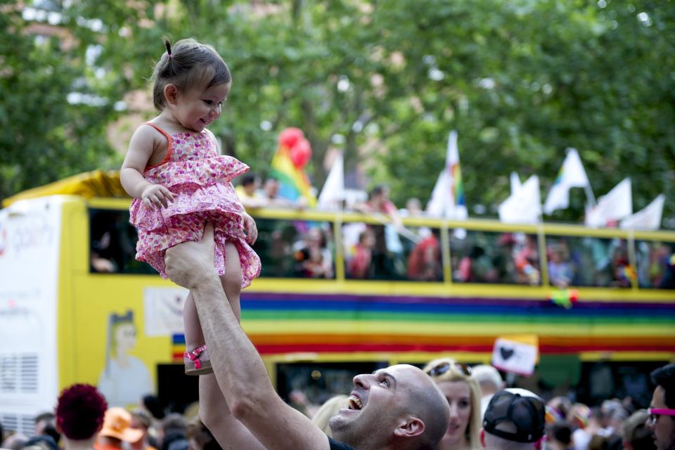 A child with her father takes part in the Gay Pride parade in Madrid on July 5, 2014 in Madrid, Spain. (Photo by Juan Naharro Gimenez/Getty Images)