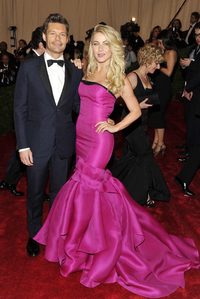 Ryan Seacrest and Julianne Hough arrive at the Metropolitan Museum of Art Costume Institute gala benefit, celebrating Elsa Schiaparelli and Miuccia Prada, Monday, May 7, 2012 in New York. (AP Photo/Charles Sykes)