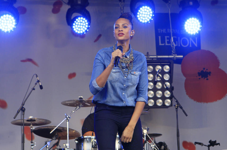 Alesha Dixon performs on stage for this year's National Poppy Appeal Launch in Trafalgar Square, central London, UK, Wednesday, Oct. 24, 2012,  ahead of Remembrance Day on the second Sunday of November. (Photo by Joel Ryan/Invision/AP)