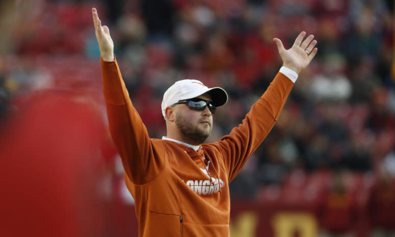 Texas football head coach Tom Herman signals for a touchdown vs. Iowa State.