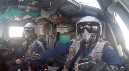 A still image, taken from video footage and released by Russia's Defence Ministry on August 18, 2016, shows pilots sitting in the cockpit of a Russian Tupolev Tu-22M3 long-range bomber based at Iran's Hamadan, at an unknown location. Ministry of Defence of the Russian Federation/Handout via REUTERS TV