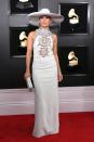 <p>The singer showed up to Grammy Awards in an embellished ivory dress with an oversized wide-brim hat. </p>