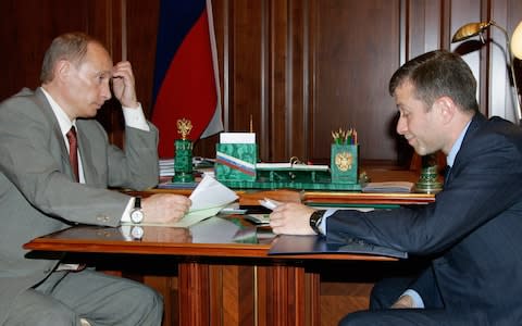 Russian President Vladimir Putin meets with Roman Abramovich in Moscow in 2005 - Credit: Reuters
