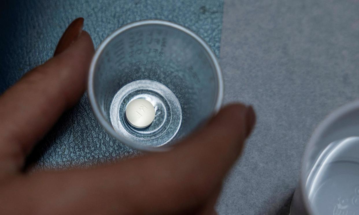 <span>A patient prepares to take mifepristone, the first pill given in an abortion, at the Women's Reproductive Clinic of New Mexico.</span><span>Photograph: Evelyn Hockstein/Reuters</span>