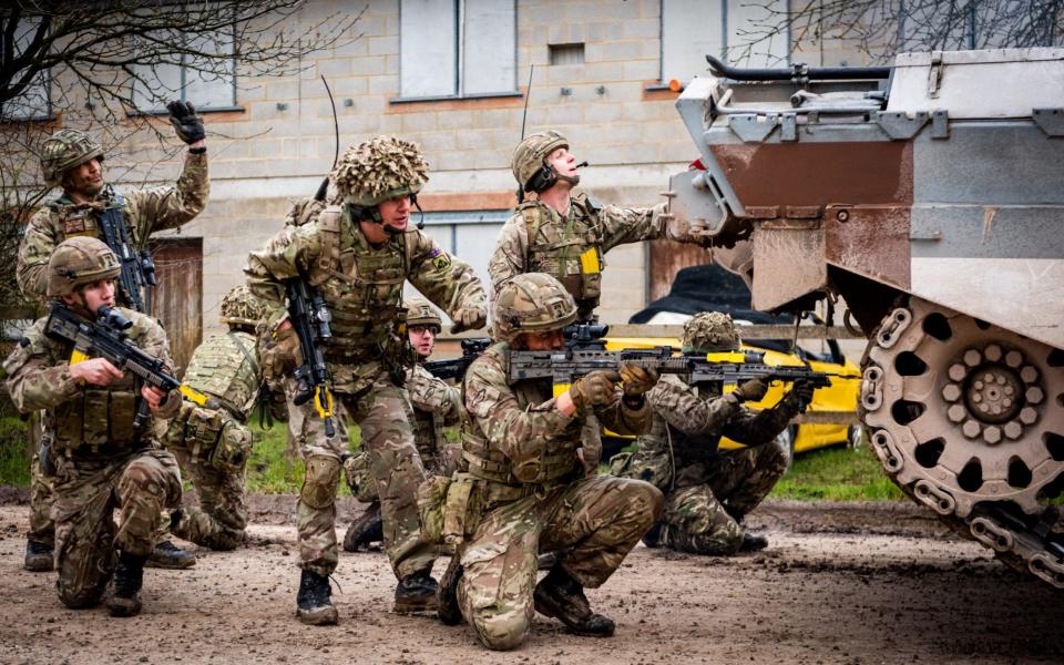 The Royal Tank Regiment on an exercise with a Challenger 2 tank. The new Ajax vehicles could pose safety risks to soldiers - BRITISH ARMY