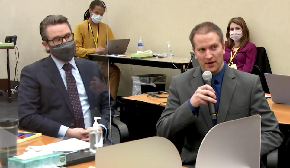 Derek Chauvin speaks to the judge as his lawyer, Eric Nelson, looks on, during his trial on April 15. (Court TV via Reuters Video)