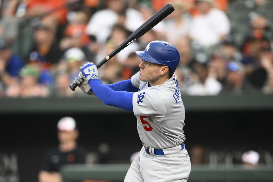 Los Angeles Dodgers' Freddie Freeman follows through on his single during the second inning of a baseball game against the Baltimore Orioles, Tuesday, July 18, 2023, in Baltimore. (AP Photo/Nick Wass)