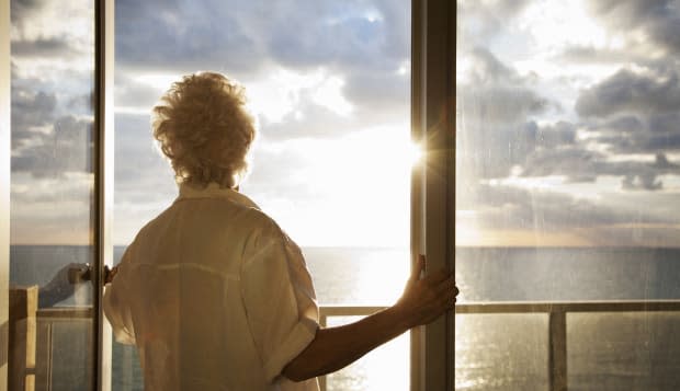 Senior Woman watching sunrise