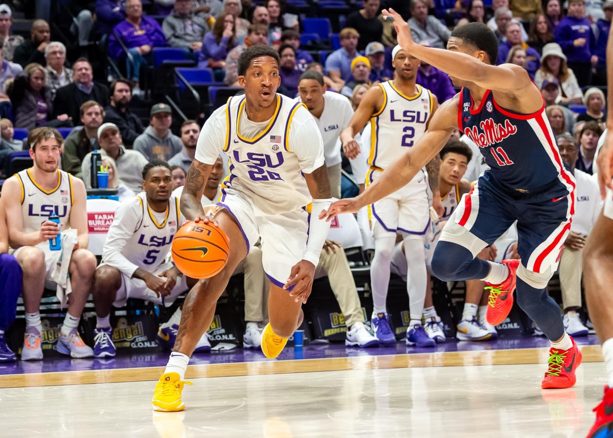 Jan 17, 2024; Baton Rouge, Louisiana, USA; Derek Fountain 20 drives to the basket as the LSU Tigers Mens Basketball take on the Ole Miss Rebels at Pete Maravich Assembly Center. Mandatory Credit: Scott Clause-USA TODAY Sports