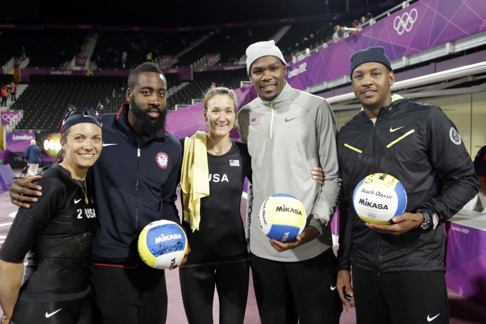 2012 SUMMER OLYMPICS -- Women's Beach Volleyball: US vs. Austria -- Pictured: (l-r) Misty Mae-Treanor, Tyson Chandler, Kerri Walsh-Jennings, Kevin Durant, Carmelo Anthony -- (Photo by: Paul Drinkwater/NBCU Photo Bank/NBCUniversal via Getty Images via Getty Images)