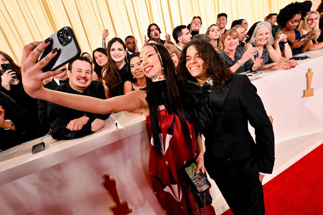 Quannah Chasinghorse and D'Pharaoh Woon-A-Tai at the 96th Annual Oscars held at at the Ovation Hollywood on March 10, 2024 in Los Angeles, California. (Photo by Michael Buckner/Variety via Getty Images)