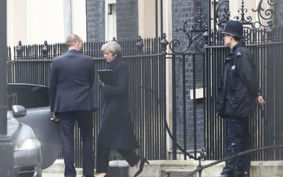 Theresa May leaving Downing Street on Thursday morning - Credit: NEIL HALL/Reuters