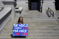 <p>Isabella Yow 16, sophomore at Cherry Creek High School makes one more picture as she joined students at the Denver State Capitol and schools across the nation with walkouts/gun violence protests on the one month anniversary of the Parkland, Florida shooting. March 14, 2018 Denver, Colorado. (Photo: Getty Images) </p>