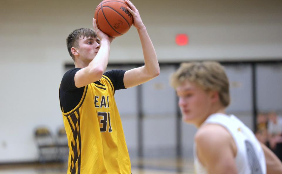 Zeeland East's Layne Risdon goes up for a shot against Hamilton on Tuesday, Dec. 5, 2023.