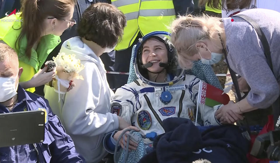 In this grab taken from video released by the Roscosmos Space Corporation Marina Vasilevskaya of Belarus sits in a chair shortly after the landing of the Russian Soyuz MS-24 space capsule near Zhezkazgan, Kazakhstan, Saturday, April 6, 2024. The Soyuz capsule carrying NASA astronaut Loral O'Hara, Oleg Novitsky of Roscosmos and Marina Vasilevskaya of Belarus touched down on Saturday. (Roscosmos Space Corporation via AP)