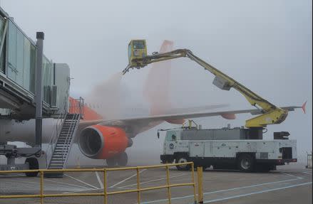 EasyJet plane de-iced at Gatwick Airport as London is hit by freezing fog on 7 February 2023.