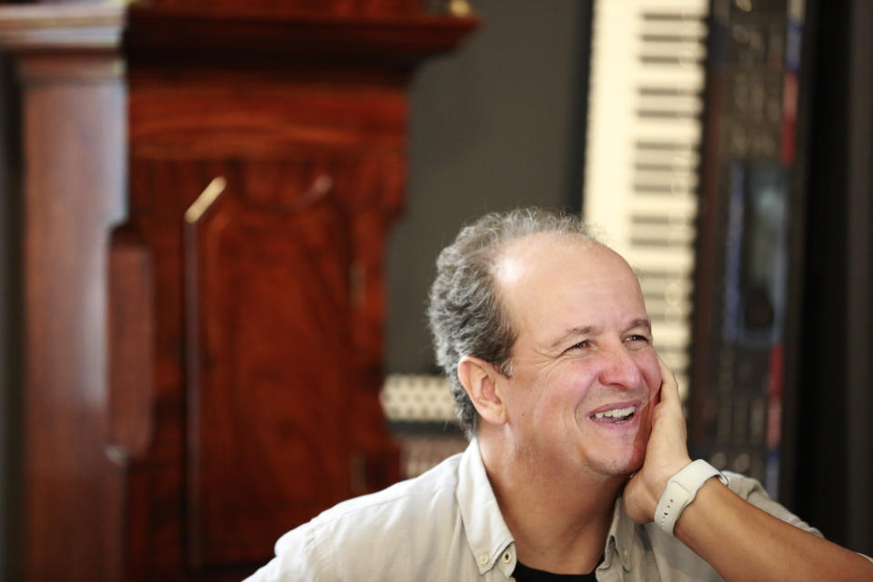 Colombian producer Julio Reyes Copello appears during an interview about a new Abbey Road Institute on Tuesday, Feb. 25, 2020, in Miami. The Abbey Road Institute announced that it will open its first music school in the United States in partnership with Copello. (AP Photo/Brynn Anderson)