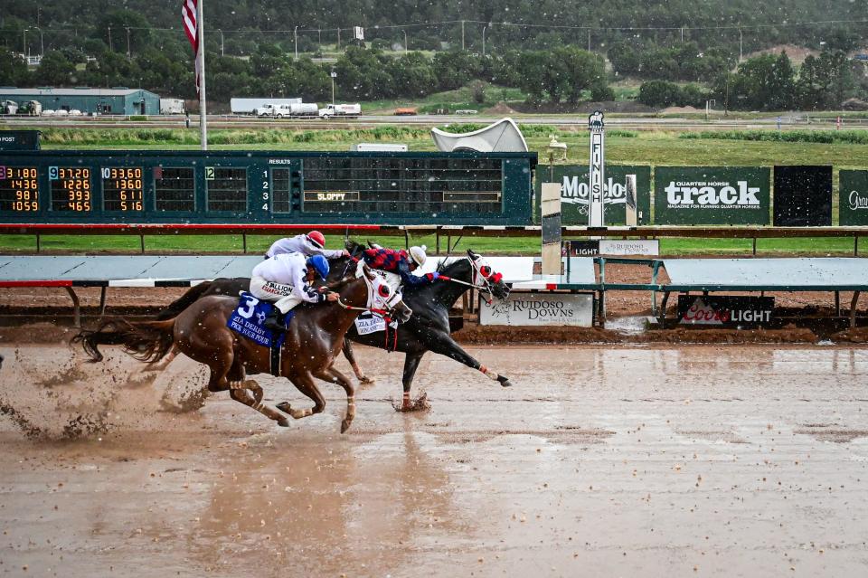 Doing Something Good wins the 400-yard Zia Quarter Horse Derby for New Mexico breds on Saturday at Ruidoso Downs Race Track and Casino.